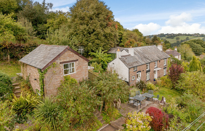 An image of 'Harmony Cottage and Sleepy's Barn'